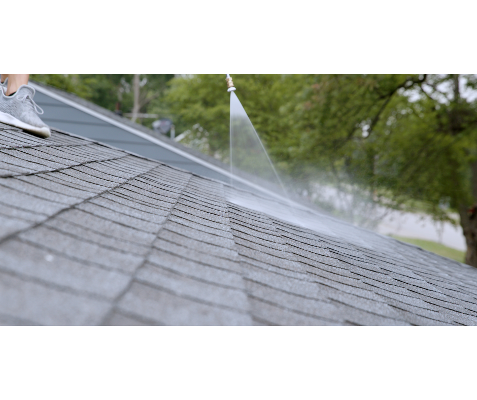 Close-up of GreenSoy treatment being sprayed onto an asphalt shingle roof